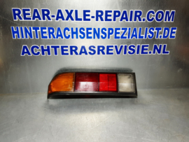 Achterlicht links Opel Manta B met zwarte rand, merk Hella.