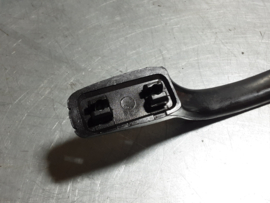Zwarte handgreep Opel Manta A, zit in interieur.