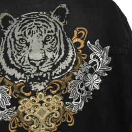 Black denim jacket with tiger patch and ornaments in gold and silver