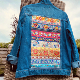 Ibiza denim jacket embellished with colored flower power trims