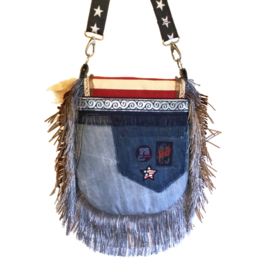 Crossbody American flag with fringes and jeans