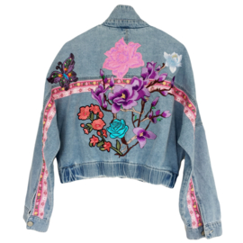 Embellished denim jacket with big flower patches in pink and purple