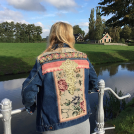 Embellished denim jacket with roses and ornament