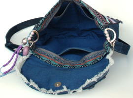 Crossbody in Aztec style blue with fringes and flower