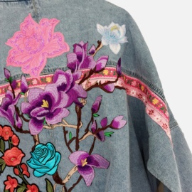 Embellished denim jacket with big flower patches in pink and purple