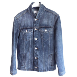 Embellished denim jacket colored with big pompons