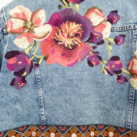 Upcycled denim jacket with big flowers and ribbon and lace hippie style