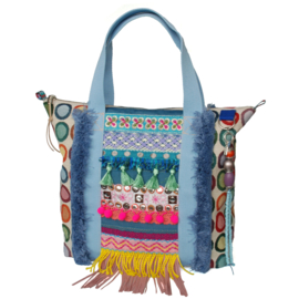Ibiza tote handbag colored with fringes and jeans