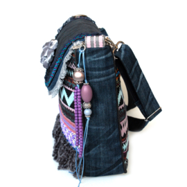 Crossbody in Aztec style blue with fringes and flower