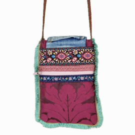 Phone bag in Ibiza style with colored ikat pattern and old jeans flap