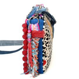 Parrot crossbody with pompons and fringe