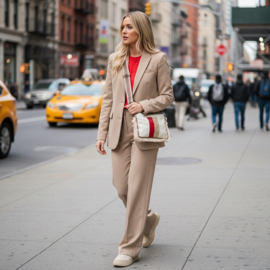 Crossbody made from an old leather jacket and recycled denim in cream and red