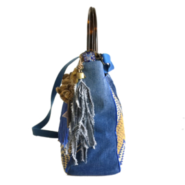 Boho handbag in blue yellow with fringe and jeans