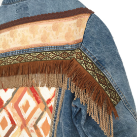 Embellished denim jacket in boho western style with fringe