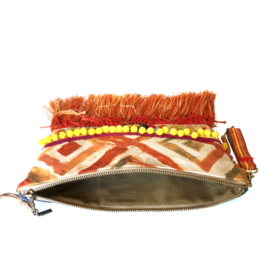 Boho clutch in orange and yellow with fringe