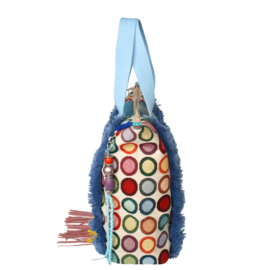 Ibiza tote handbag colored with fringes and jeans