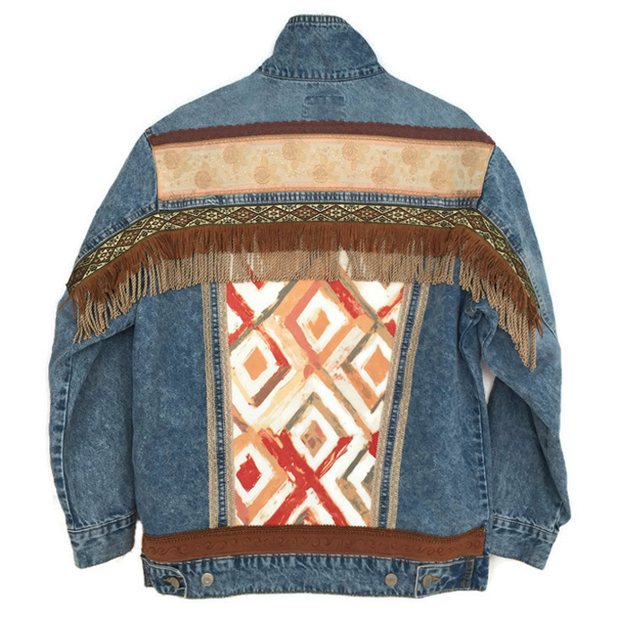 Embellished denim jacket in boho western style with fringe