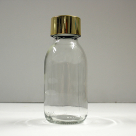 glazen flesje met gouden dop