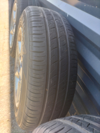 14 inch aluminium velgen met band 175/65R14 Nissan 40300-51C26 B13/ N14/ Y10 (20250520) Gebruikt.
