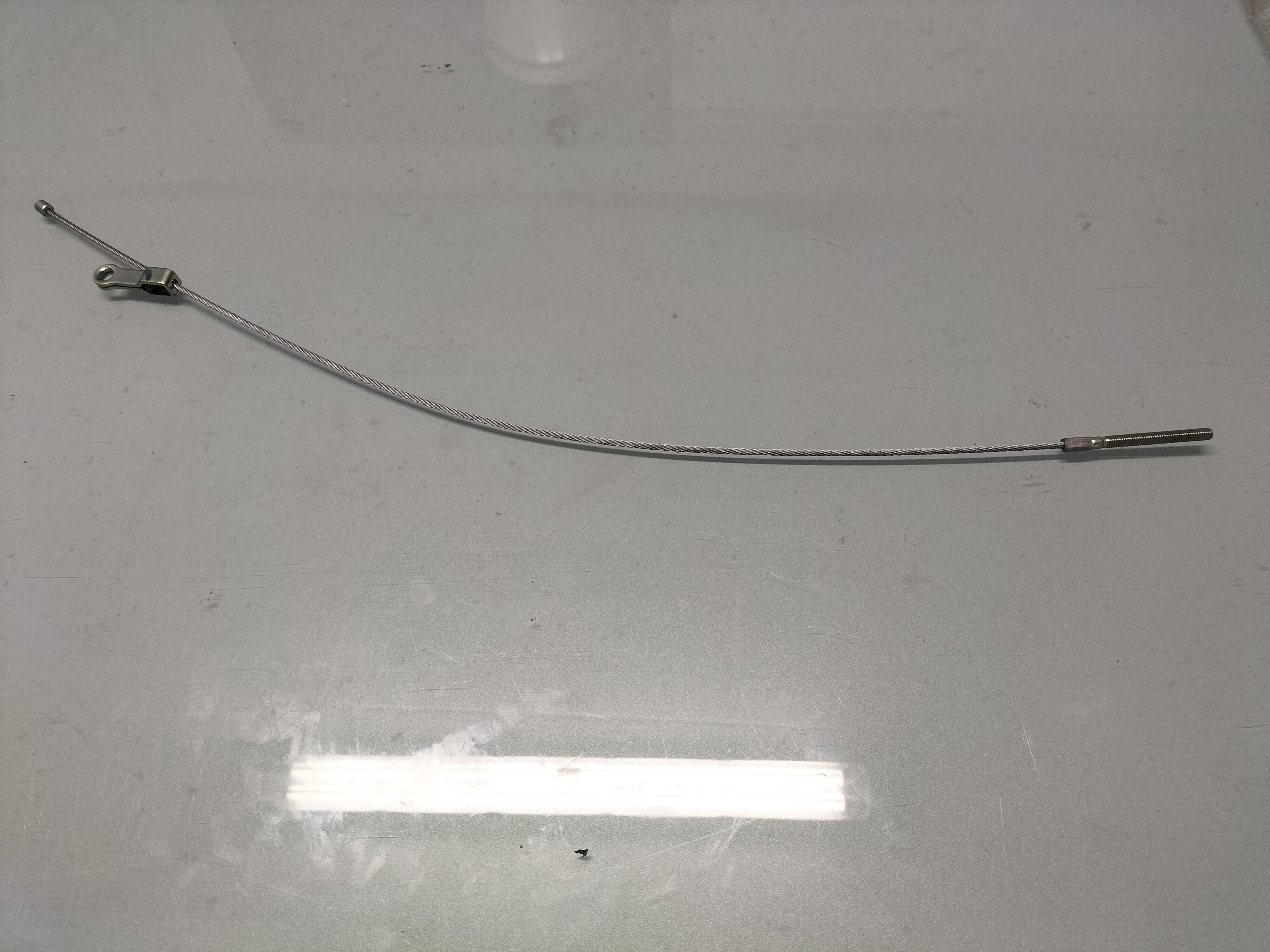 Handrem Kabel Nissan 36450-M0201 Origineel.