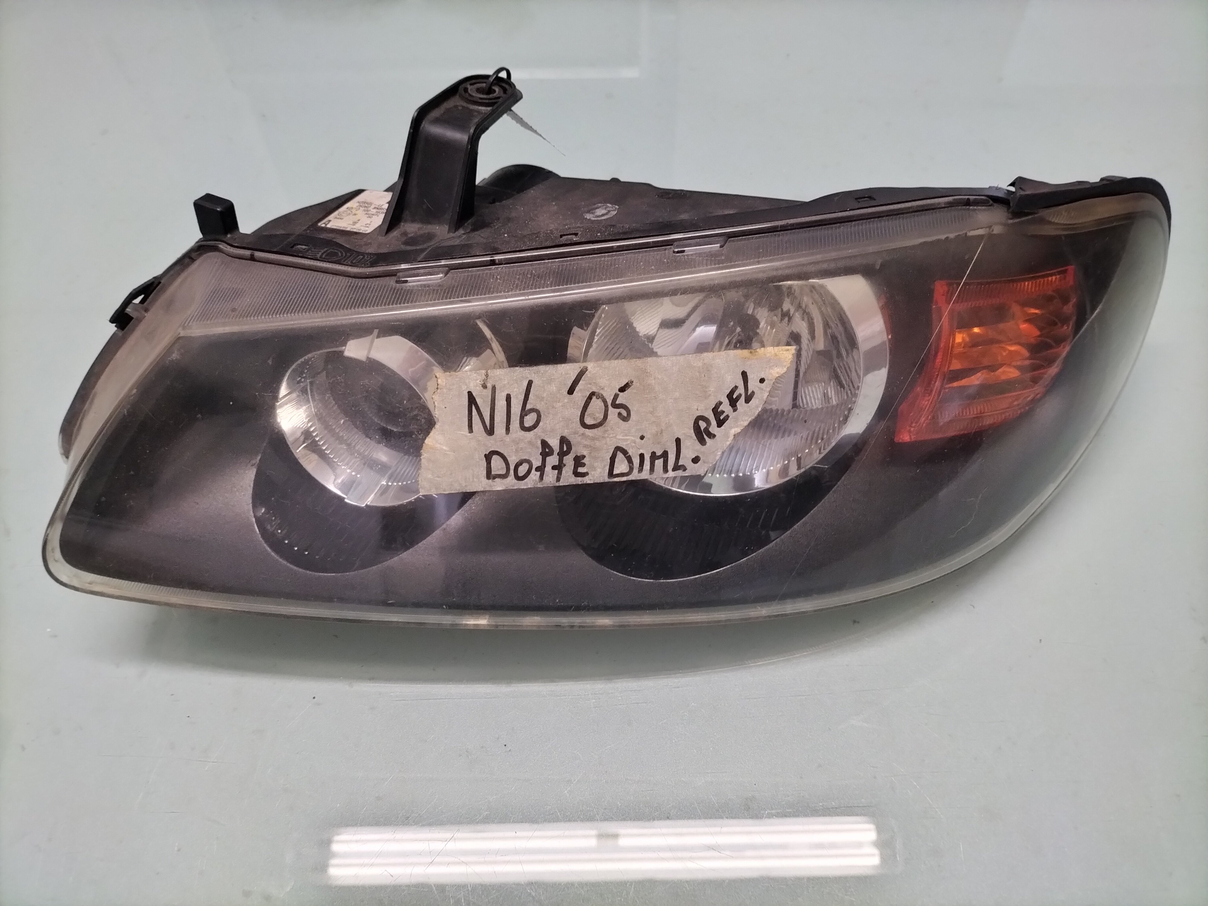 Koplamp Nissan Almera N16 26060-BN665 Doffe dimlicht reflectie Gebruikt