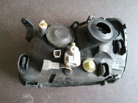 Koplamp rechts Nissan Almera Tino V10 26010-BU200 Gebruikt.