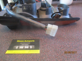 Achterlicht links Nissan Vanette C120 26555-G4000 Origineel.