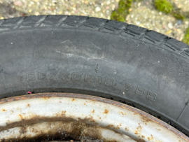 Stalen velg met band 13 inch 155/70R13 40300-24B00 Nissan Micra K10 Gebruikt.