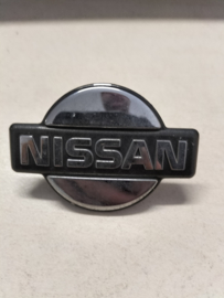 Emblem front Nissan Micra K10 62890-22B00 Used part.