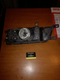 Koplamp rechts Nissan Almera N15 26010-2N328 Gebruikt.