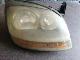 Koplamp rechts Nissan Almera Tino V10 26010-BU200 Gebruikt.