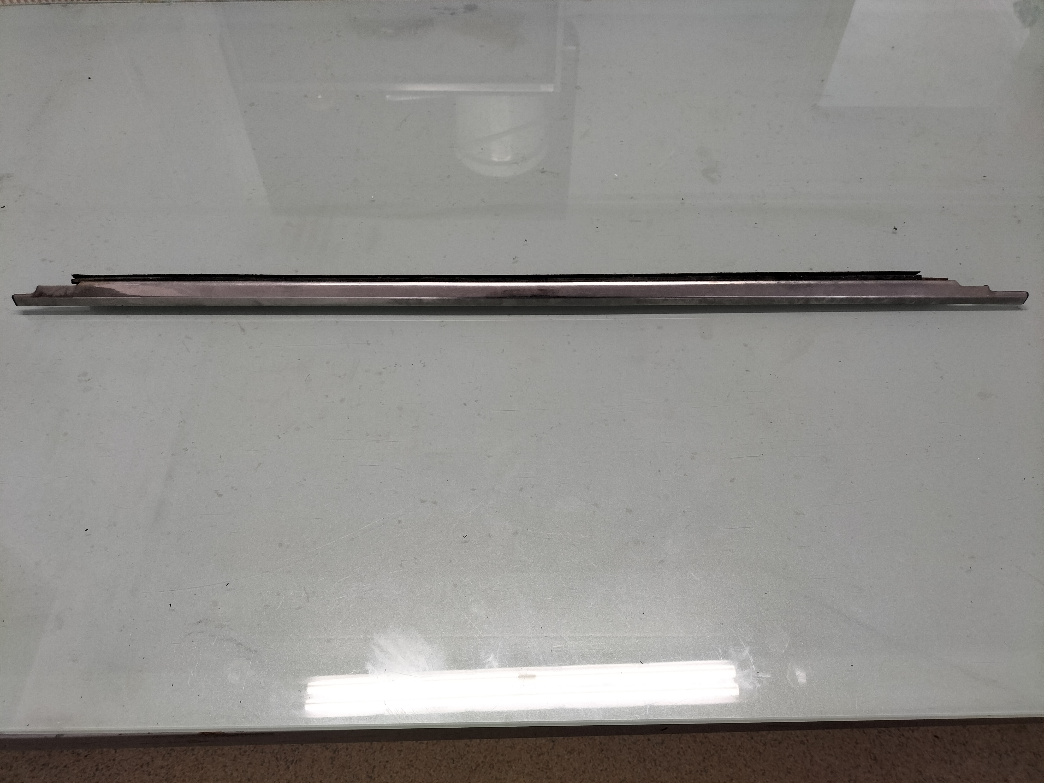 Assy-weatherstrip waist, front left-hand Datsun Cherry E10 80319-M0204 Used part.