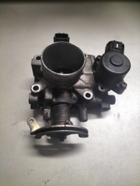 Gasklephuis QG18DE Nissan 16119-7J602 N16/ P11/ V10/ WP11 Gebruikt.