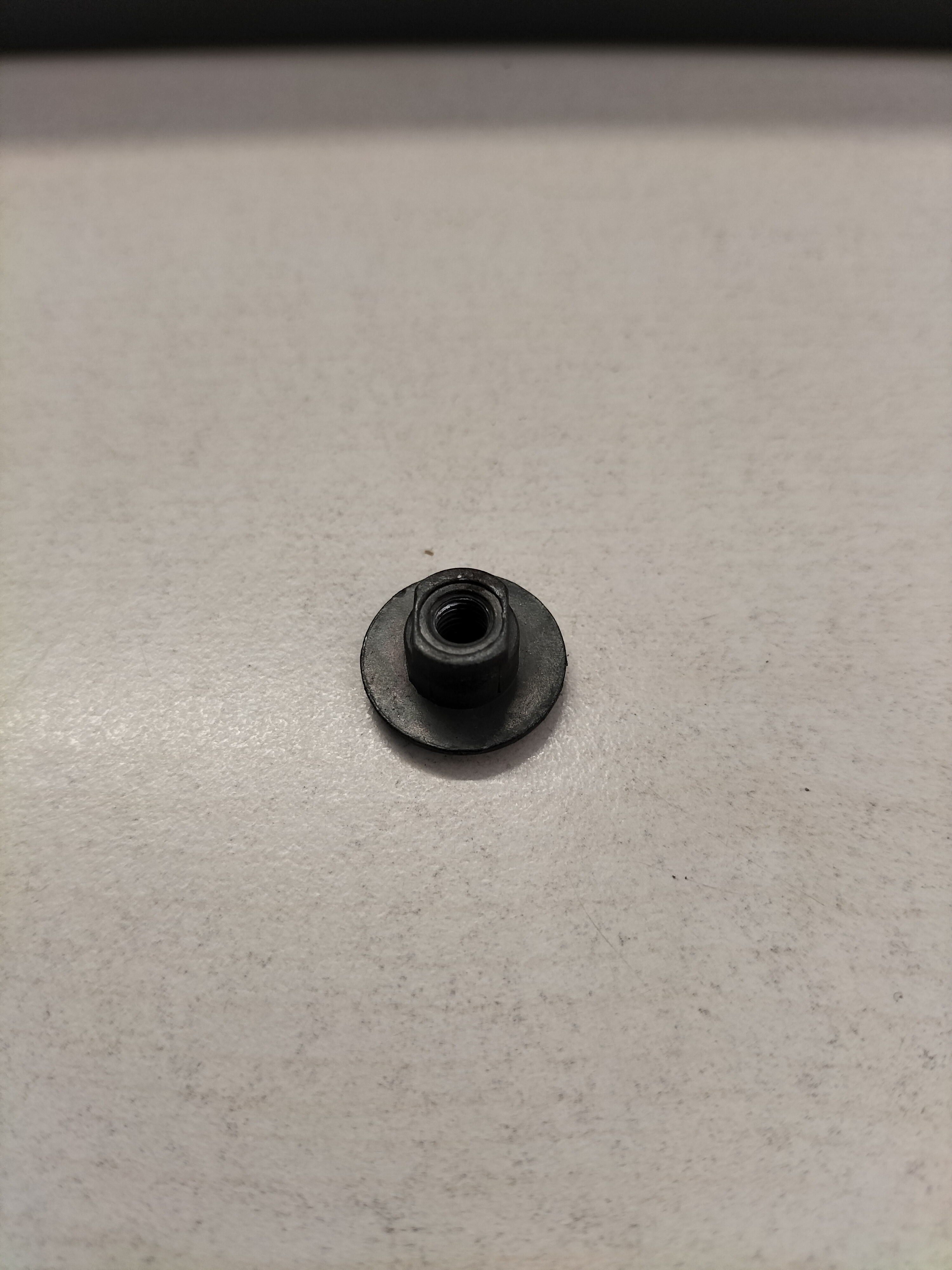 Nut-finish Nissan Micra K10 76844-01B00 Used part.
