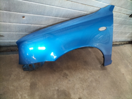 Zijscherm Nissan Micra K11 (BV4) 63101-4F100 Kras/Deuk/Roest vrij
