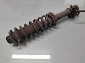 Strut front right-hand CG10DE/ CG13DE red/yellow Nissan Micra K11 without abs 54010-4F119 + 54302-6F625 Used part.