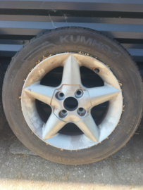 14 inch aluminium velgen met band 175/65R14 Nissan 40300-51C26 B13/ N14/ Y10 (20250520) Gebruikt.