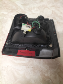 Achterlicht links Nissan Micra K10 26555-04B65 (20250326) Lichte schade.