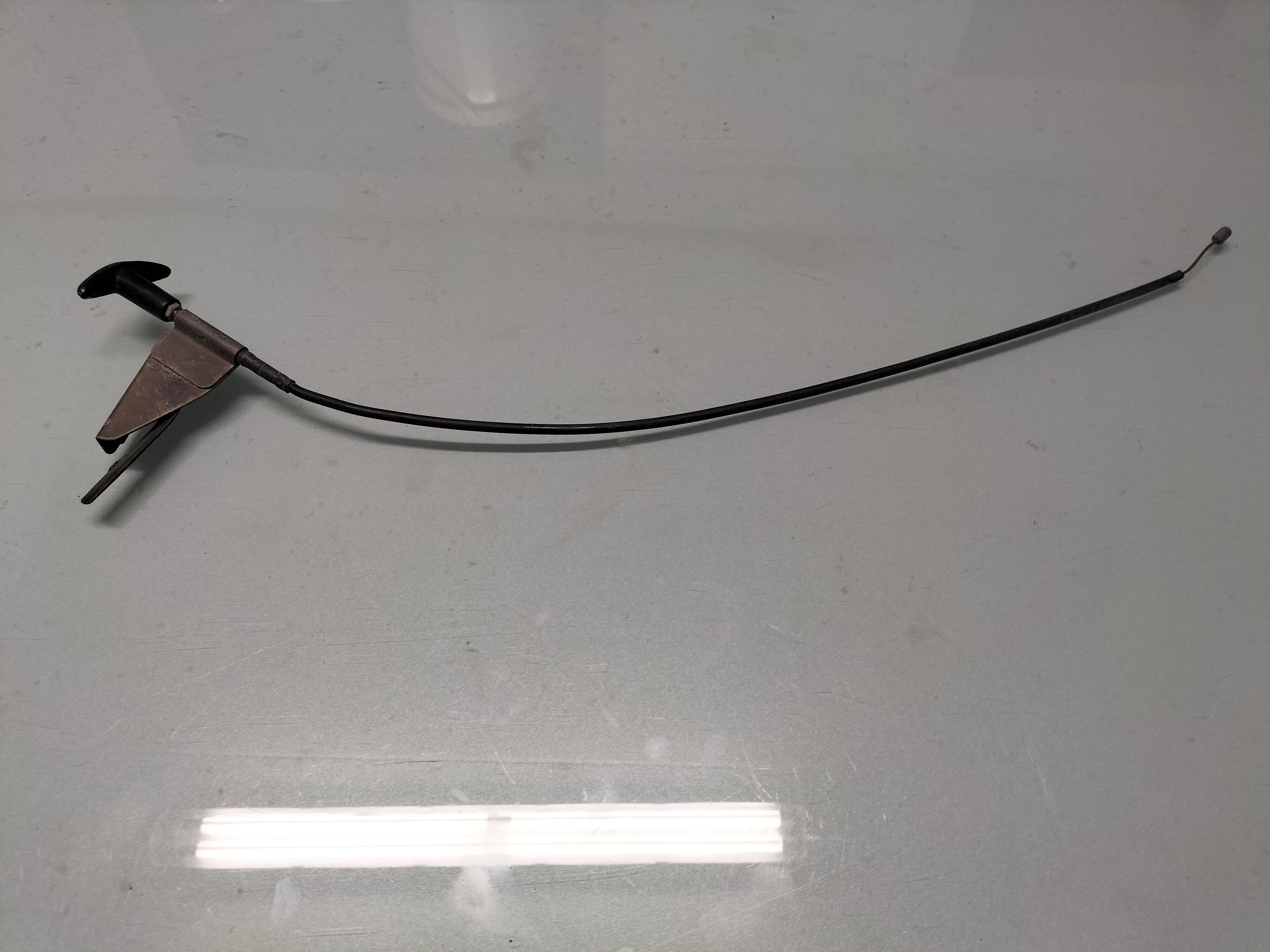 Assy-control, hood lock Datsun Cherry E10 65660-M1003 Used part.