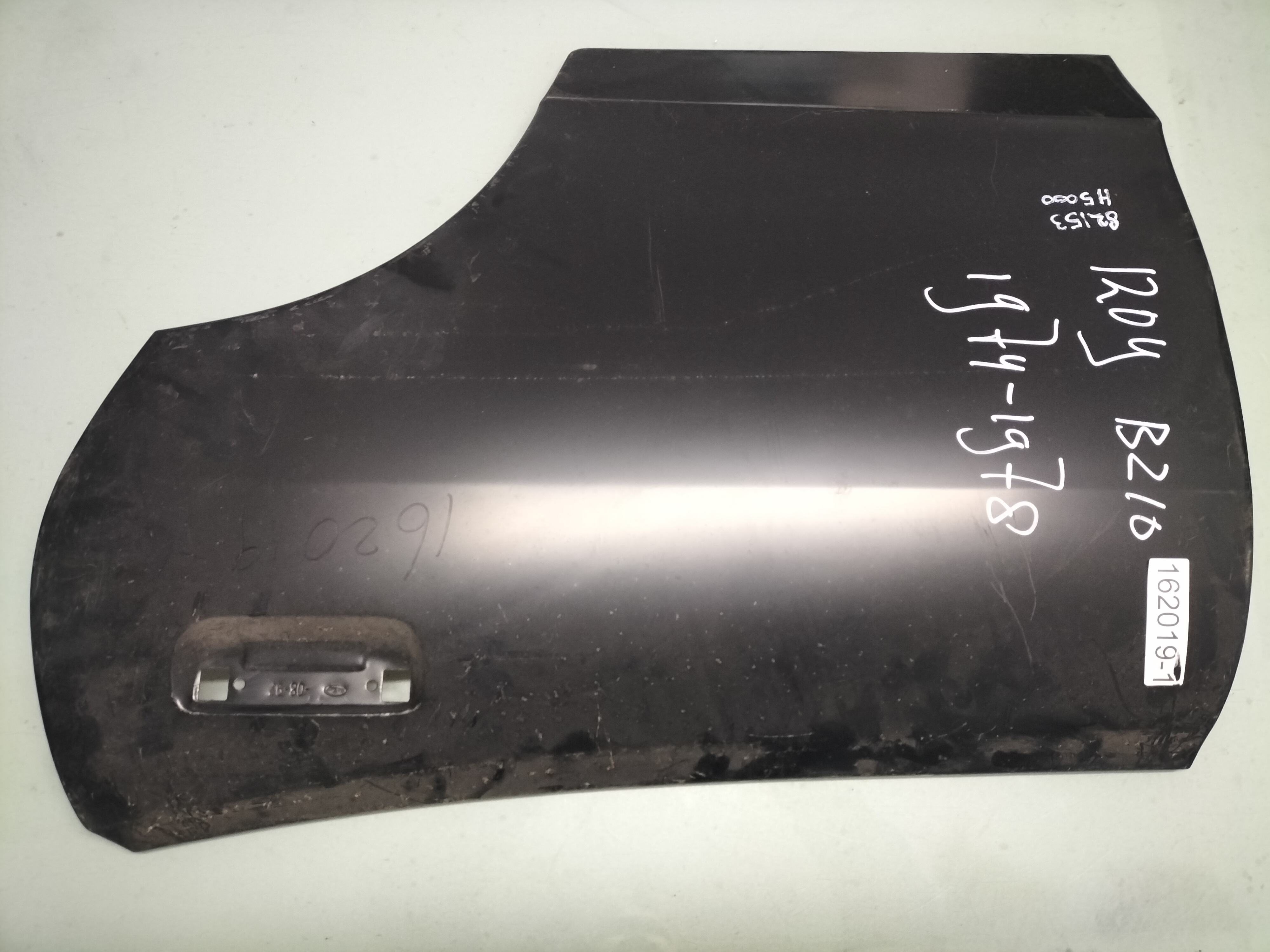 Deurpaneel buitenzijde linksachter Datsun Sunny B210 4-deurs sedan 82153-H5000 (162019-1) Nieuw.