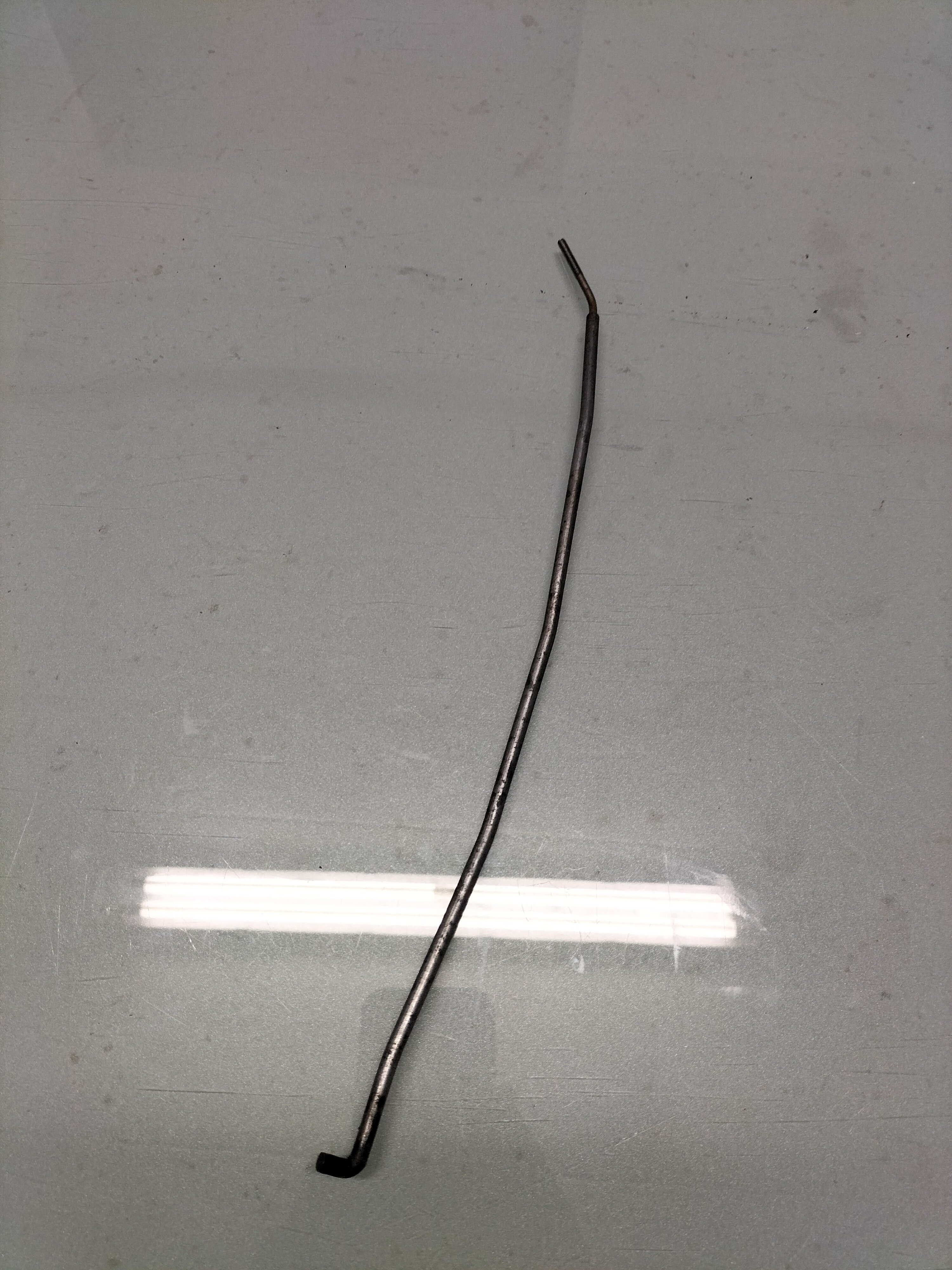 Bedieningsstang deurslot Nissan Micra K10 80513-04B00 Gebruikt.