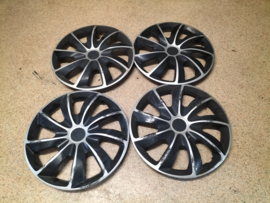 Wheel cover set 15 inch Quad universal 20250219 Used part. Little damage.