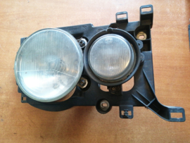 Koplamp rechts Nissan Terrano2 R20 26010-8F100 Gebruikt.