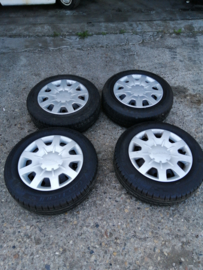 15 inch steel wheels with summer tire and wheel covers 185/65R15 4x100 ET50 Dacia Logan