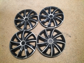 Wheel cover set 15 inch Quad universal 20250219 Used part. Little damage.