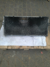 Aircocondensor Nissan Almera N15 92110-2M123 Gebruikt.