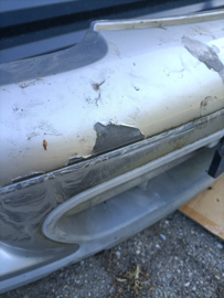 Voorbumper Nissan Micra K11 62022-1F500 (KL0) Gebruikt. Lichte schade.