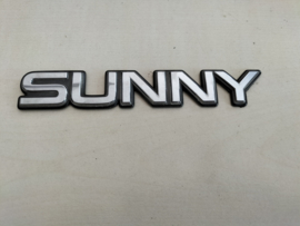 Emblem SUNNY Nissan Sunny N14 90895-60C60 Used part.