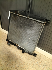 Radiateur Nissan Micra K11 21460-03B67 Gebruikt. Lichte schade.