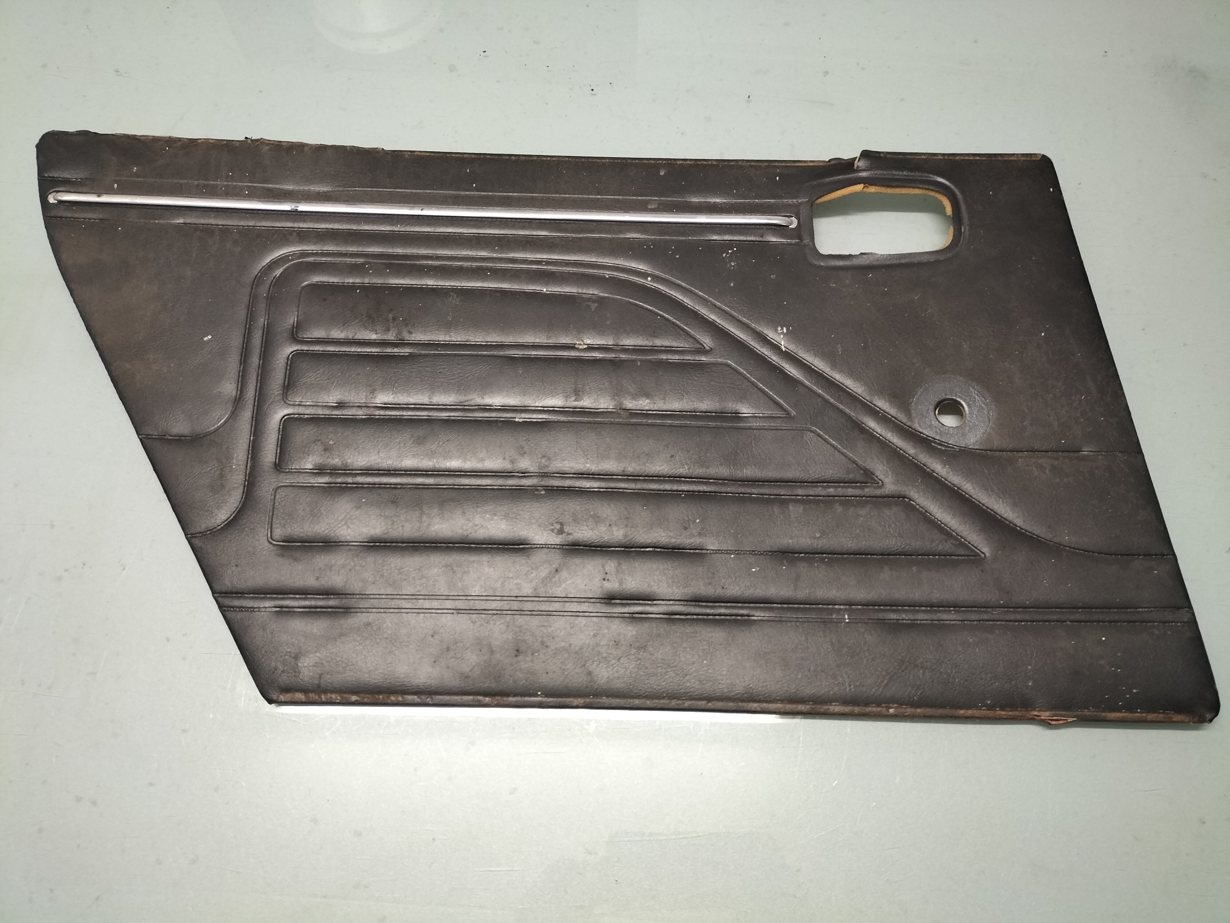 Assy-trimming rear door, left-hand Datsun Cherry E10 82901-M0400 Used part. Little damage.
